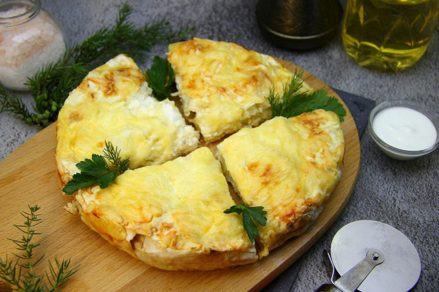 Pita bread khachapuri with cheese in the oven