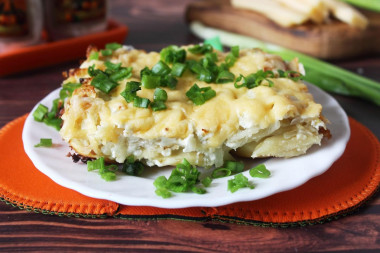 Baked dumplings in the oven with cheese