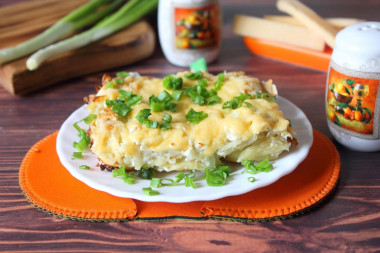 Baked dumplings in the oven with cheese