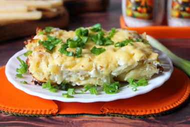 Baked dumplings in the oven with cheese