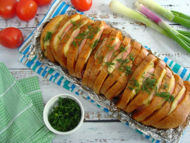 Loaf with cheese and sausage in the oven