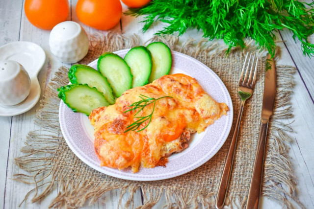 Chicken fillet chop in the oven with tomatoes