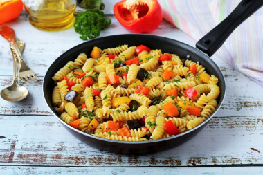 Pasta with vegetables in a frying pan