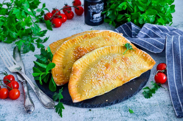 Chebureks with minced meat in the oven