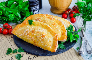 Chebureks with minced meat in the oven