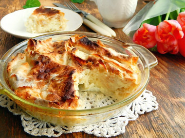 Pita bread pie with cottage cheese in the oven