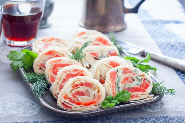 Pita bread roll with red fish and cheese