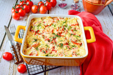 Casserole potato tomato cheese in the oven