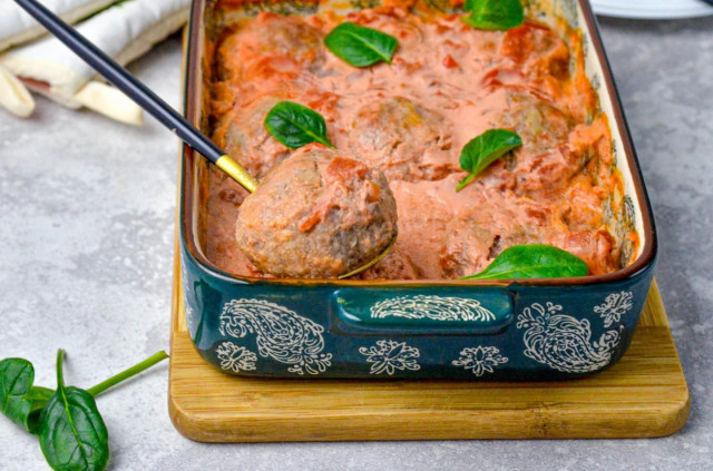 Cutlets in tomato sauce in the oven