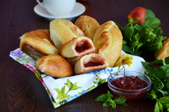 Pies with jam in the oven