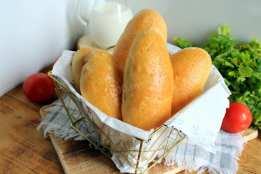 Baked pies in the oven with cabbage