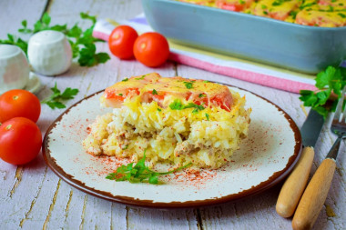 Casserole with rice and minced meat in in the oven