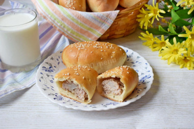 Minced meat pies in the oven made of yeast dough