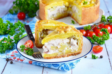 Chicken coop in the oven with chicken and potatoes