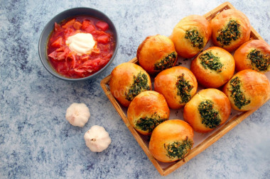 Buns with garlic and herbs in the oven