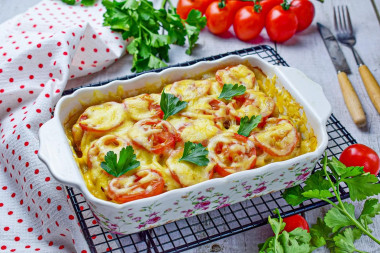 Chicken fillet with potatoes and tomatoes in the oven