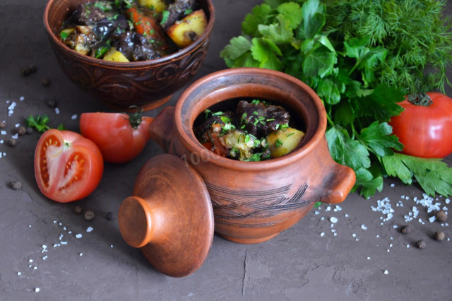 Vats in pots in the oven in Georgian