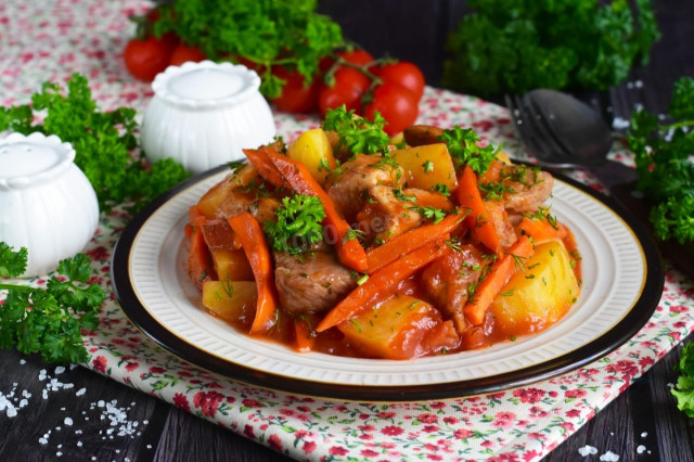 Potatoes with meat in a duck house stewed in the oven