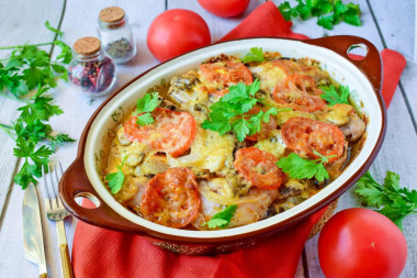 Chicken under a fur coat in the oven with potatoes and mushrooms