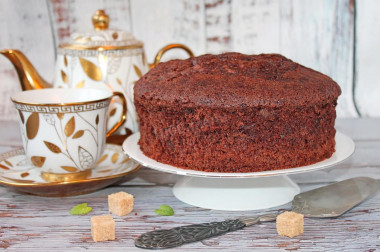 Chocolate sponge cake on boiling water in the oven