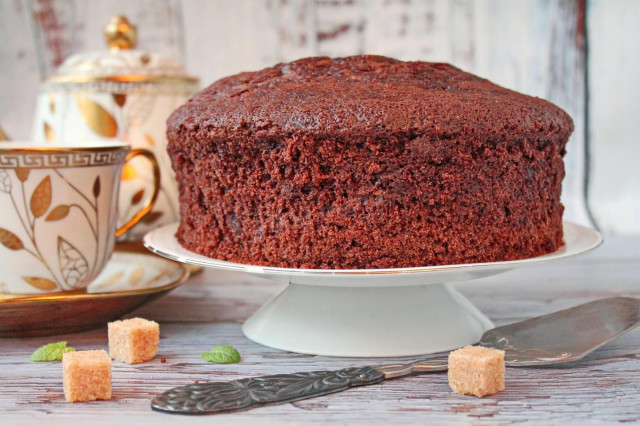 Chocolate sponge cake on boiling water in the oven