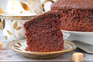 Chocolate sponge cake on boiling water in the oven