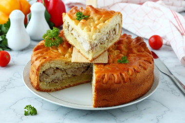 Yeast pie with meat and potatoes