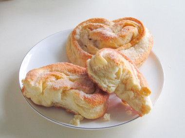 Pies with sugar from yeast dough in the oven