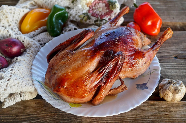 Duck with honey, soy sauce and mustard in the oven