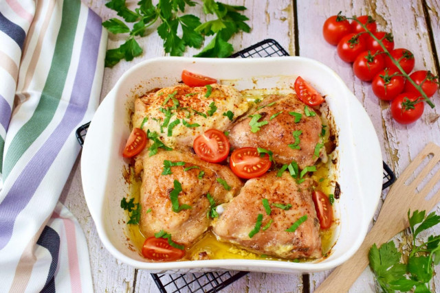 Chicken thighs in mayonnaise with garlic in the oven