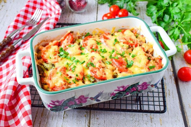 Potato casserole with minced meat and mushrooms in the oven