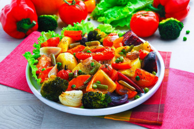 Vegetables baked in the oven on a baking sheet