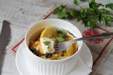 Fish baked in the oven with potatoes