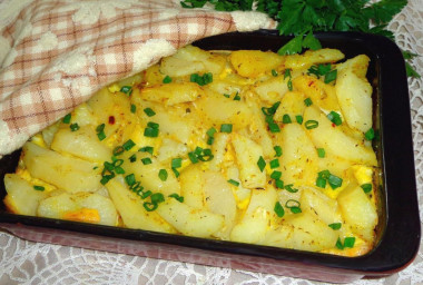 Potatoes with egg in oven