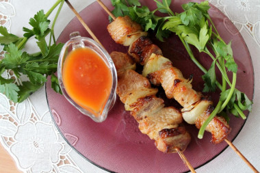 Pork kebab on skewers in the oven