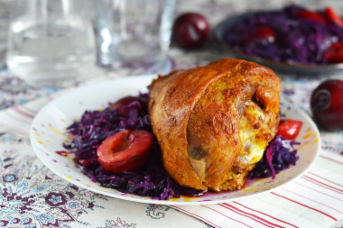 Turkey drumstick in foil in the oven