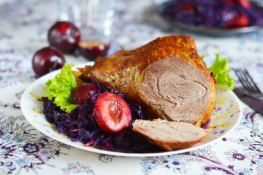 Turkey drumstick in foil in the oven