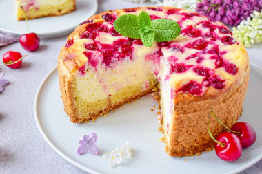 Cottage cheese pie with cherries in the oven