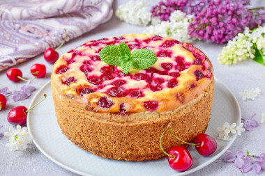 Cottage cheese pie with cherries in the oven