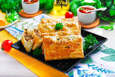 Lavash with minced meat and cheese in the oven