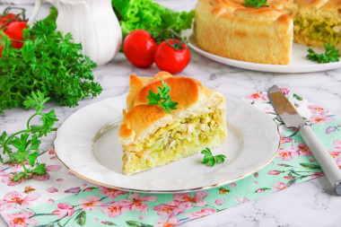 Yeast pie with fresh cabbage in the oven