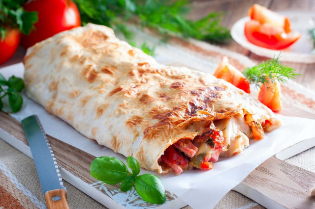 Stuffed pita bread in the oven