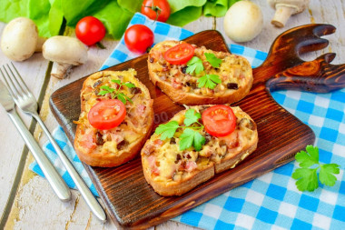 Hot sandwiches with mushrooms and cheese in the oven