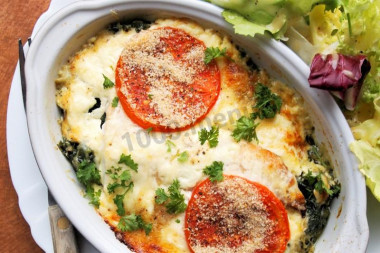 Hake baked in the oven with vegetables