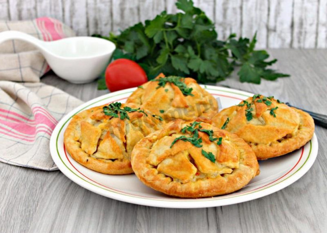 Chicken and potato pies in the oven