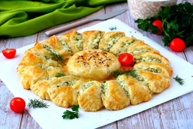 Pie with Adyghe cheese and puff pastry greens