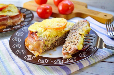 Minced mushrooms tomatoes cheese in the oven