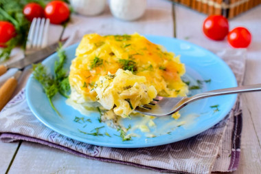 Potatoes with cheese in layers in the oven