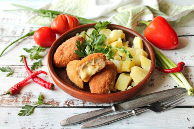 Chicken cutlets with cheese in the oven