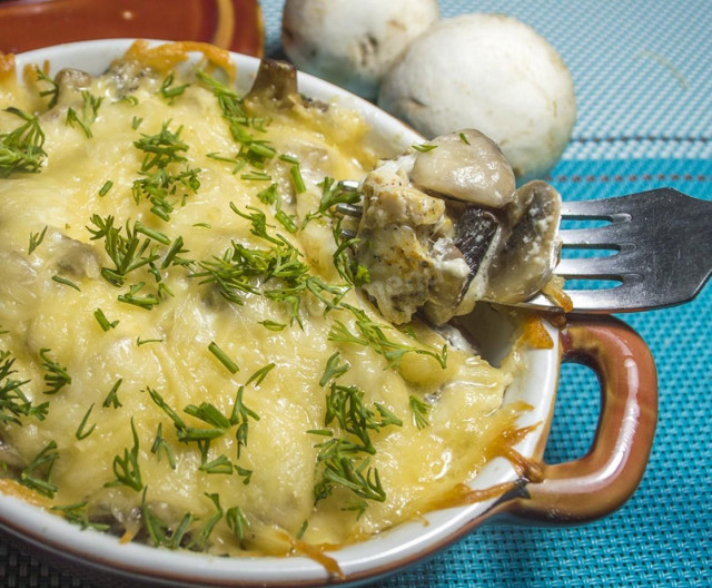 Chicken fillet with mushrooms in the oven